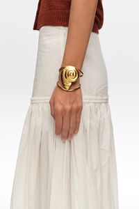 Pulsera caracola dorado envejecido