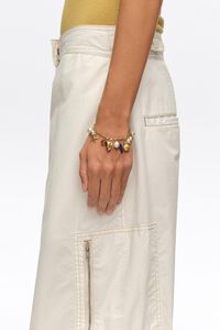 Pulsera perlas y caracolas dorado mate