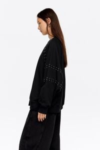 Washed black studded sweatshirt