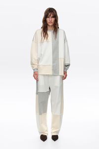 Ivory cotton patchwork jogger trousers