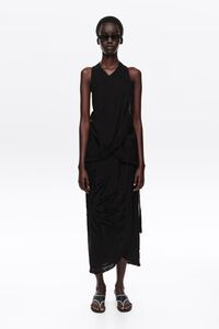 Vestido midi cruzado flecos negro