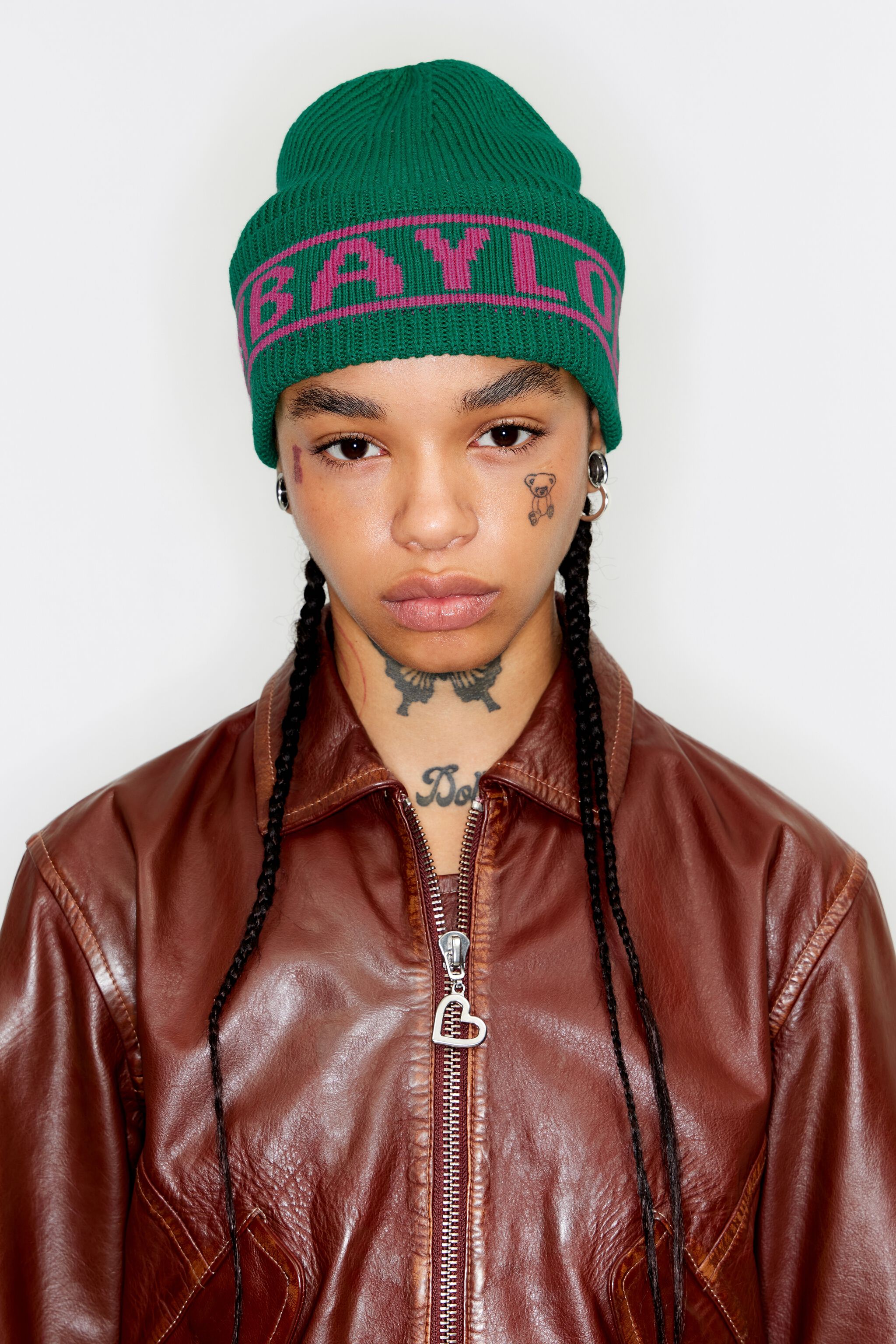 Green knit hat with logo