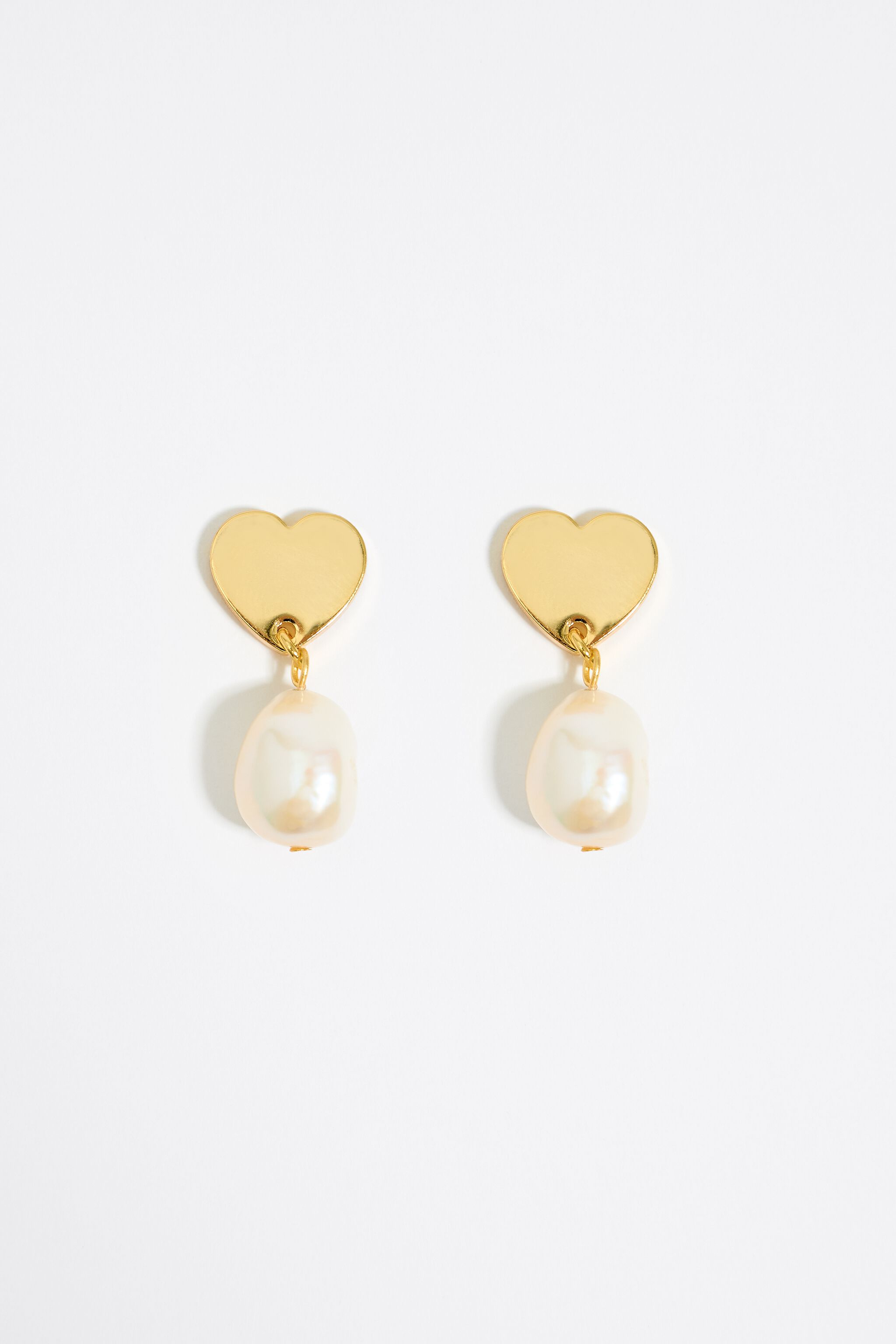 Gold hearts and pearl earrings