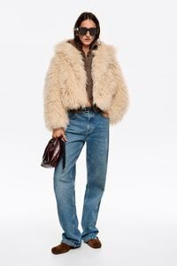 Short ivory fur coat Short ivory fur coat