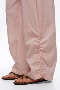 Light pink gathered jogger trousers