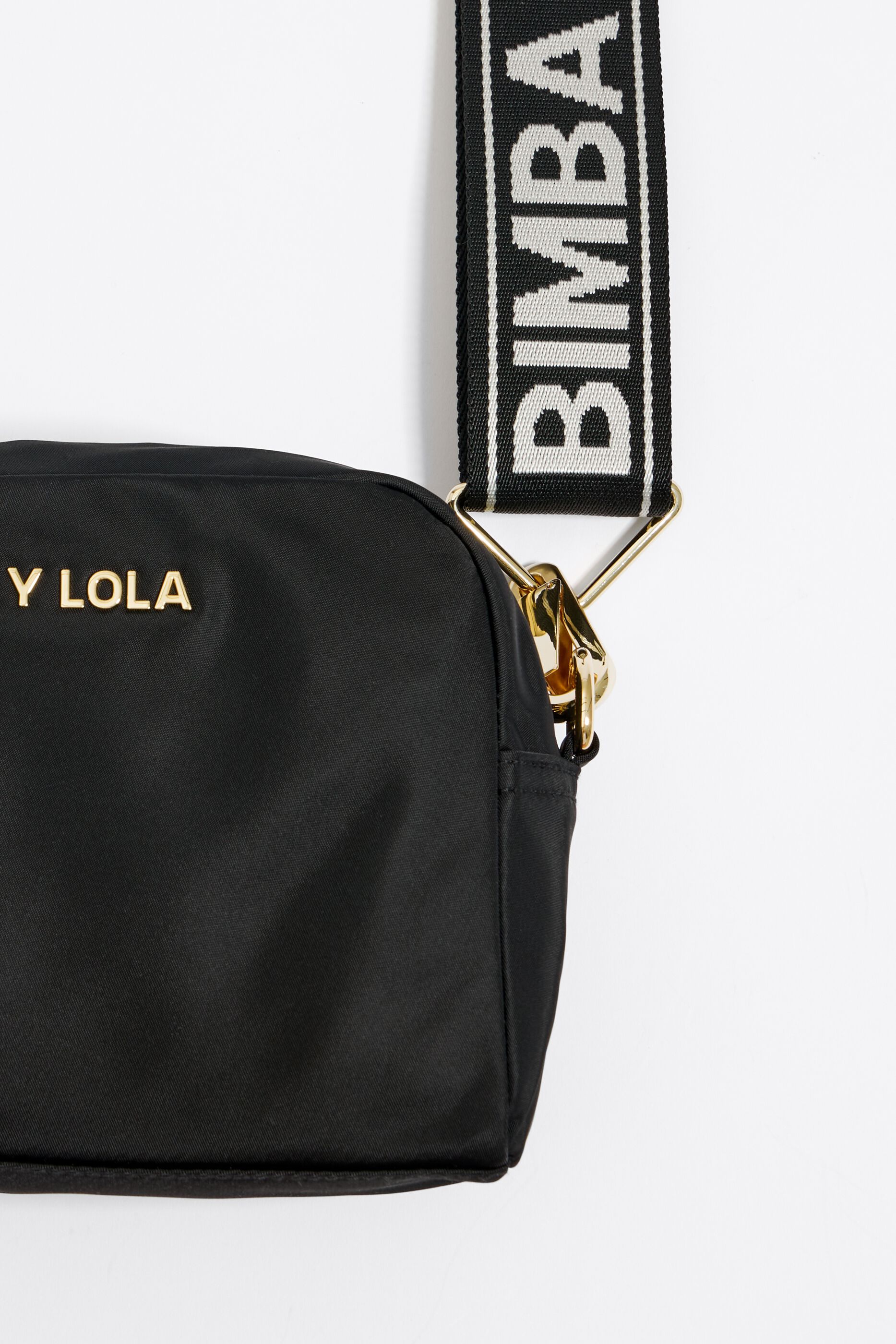 Tiny black hot sale crossbody bag
