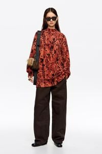 Suéter cuello alto pelo Lynx café