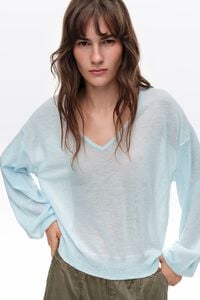 Light blue wool V-neck sweater