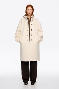 Abrigo lana bouclé midi blanco hueso