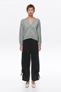 Faded black ruched denim jogger trousers