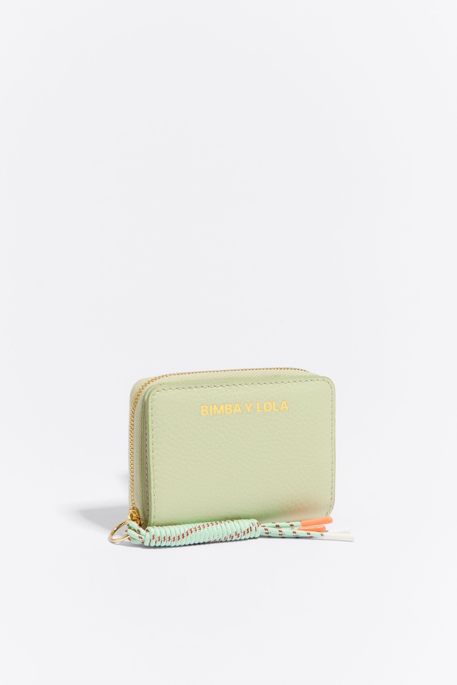 Cartera solapa piel verde pastel