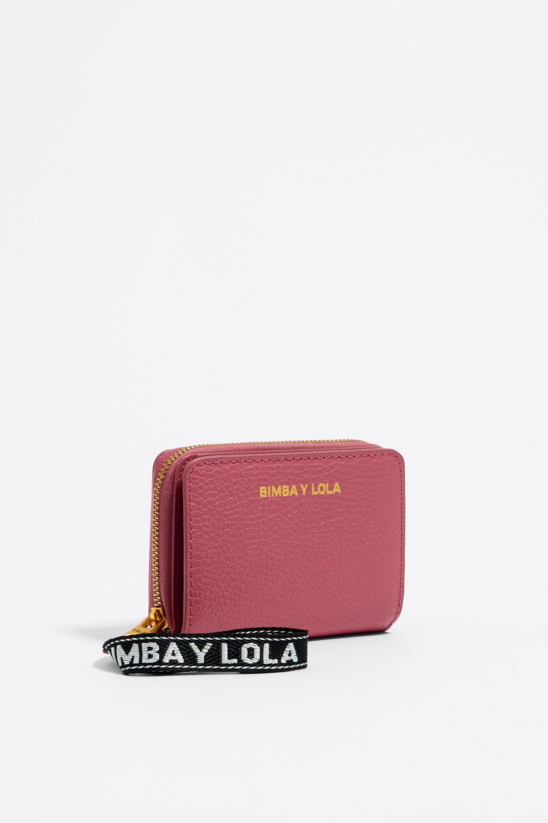 Cartera con solapa de piel rosa