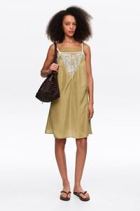 Short green silk strappy dress