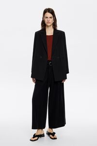 Black flared ankle-length trousers Black flared ankle-length trousers