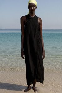 Vestido midi cruzado flecos negro