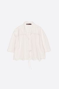 White linen shirt with ties and lace