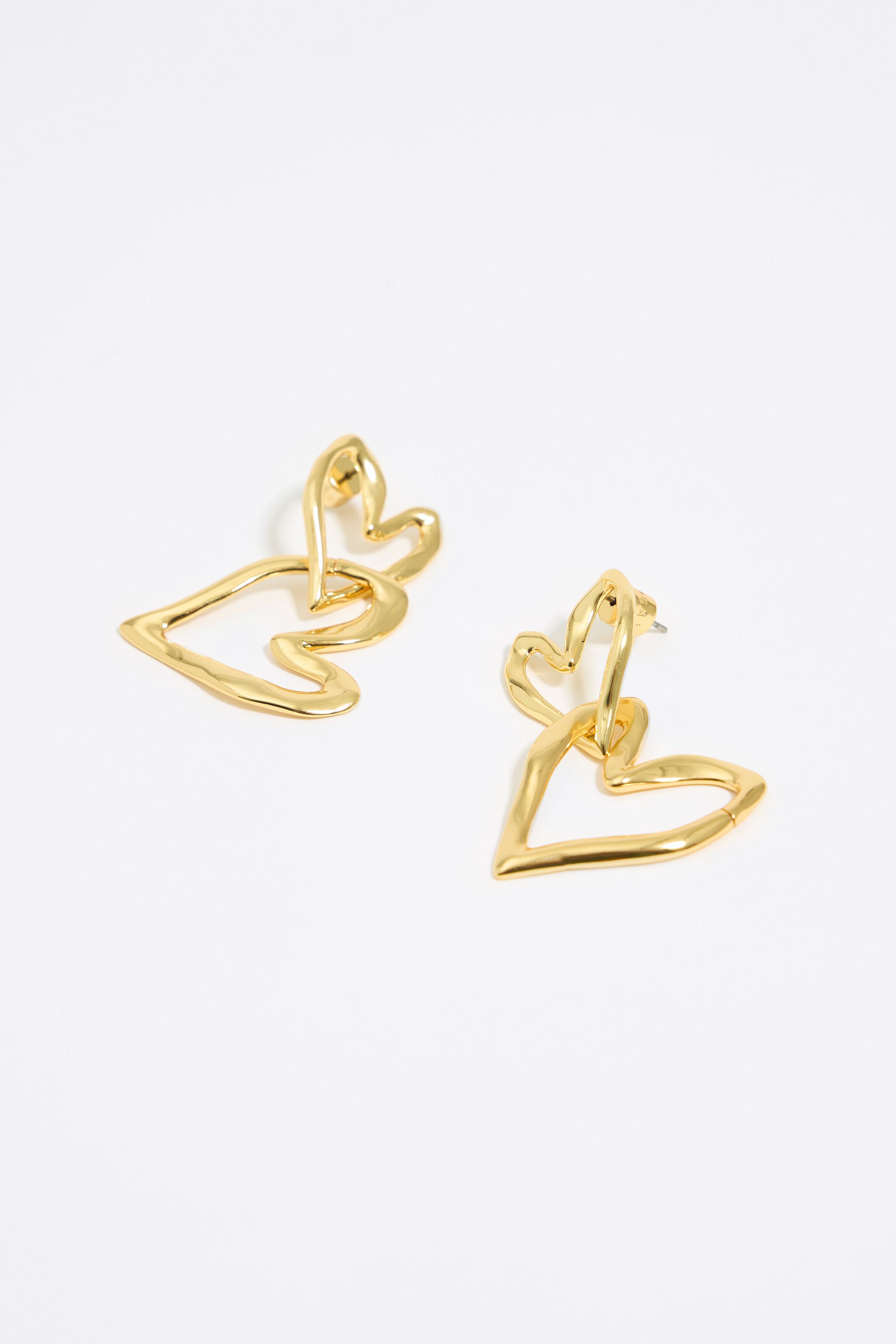 Gold double textured heart earrings