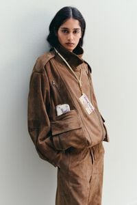 Tarjetero-monedero Bimba logo amarillo p&uacute;rpura