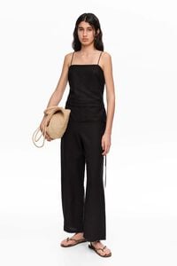 Black linen jumpsuit with adjustable waist and stones