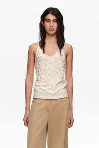 Beige top with mother-of-pearl pieces