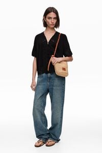 Small natural raffia plaited bag