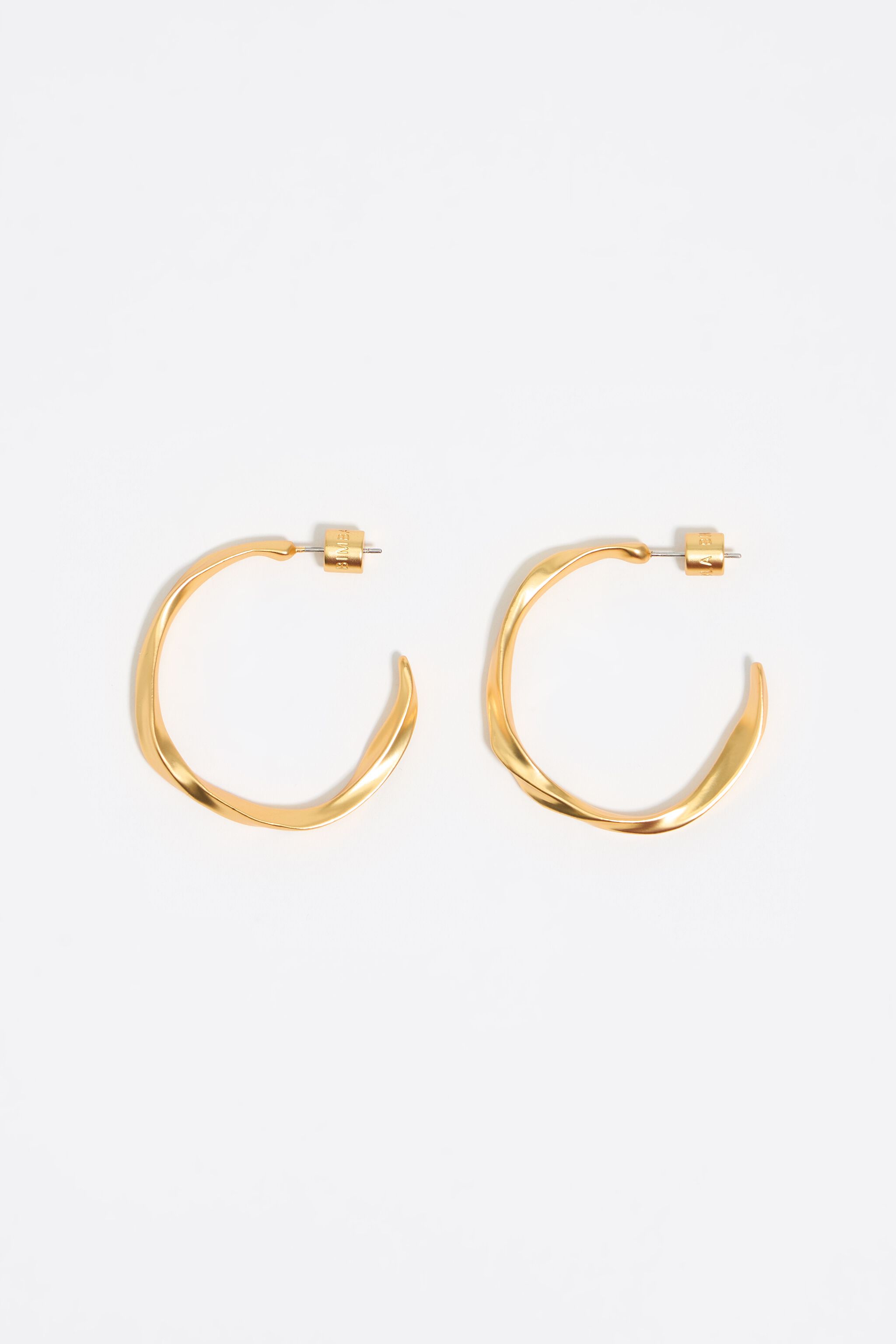 Maxi matte gold uneven hoop earrings Maxi matte gold uneven hoop earrings