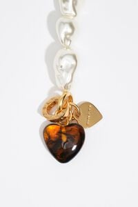 Elastic bracelet with pearls and amber resin heart