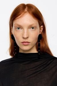 Aretes rosa flocada negro