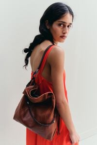 Medium dark tan leather Paper bag