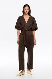 Washed brown denim V-neck jumpsuit Washed brown denim V-neck jumpsuit