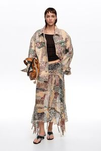 Falda fluida irregular desflecada Lace marfil