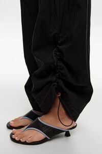 Black gathered jogger trousers