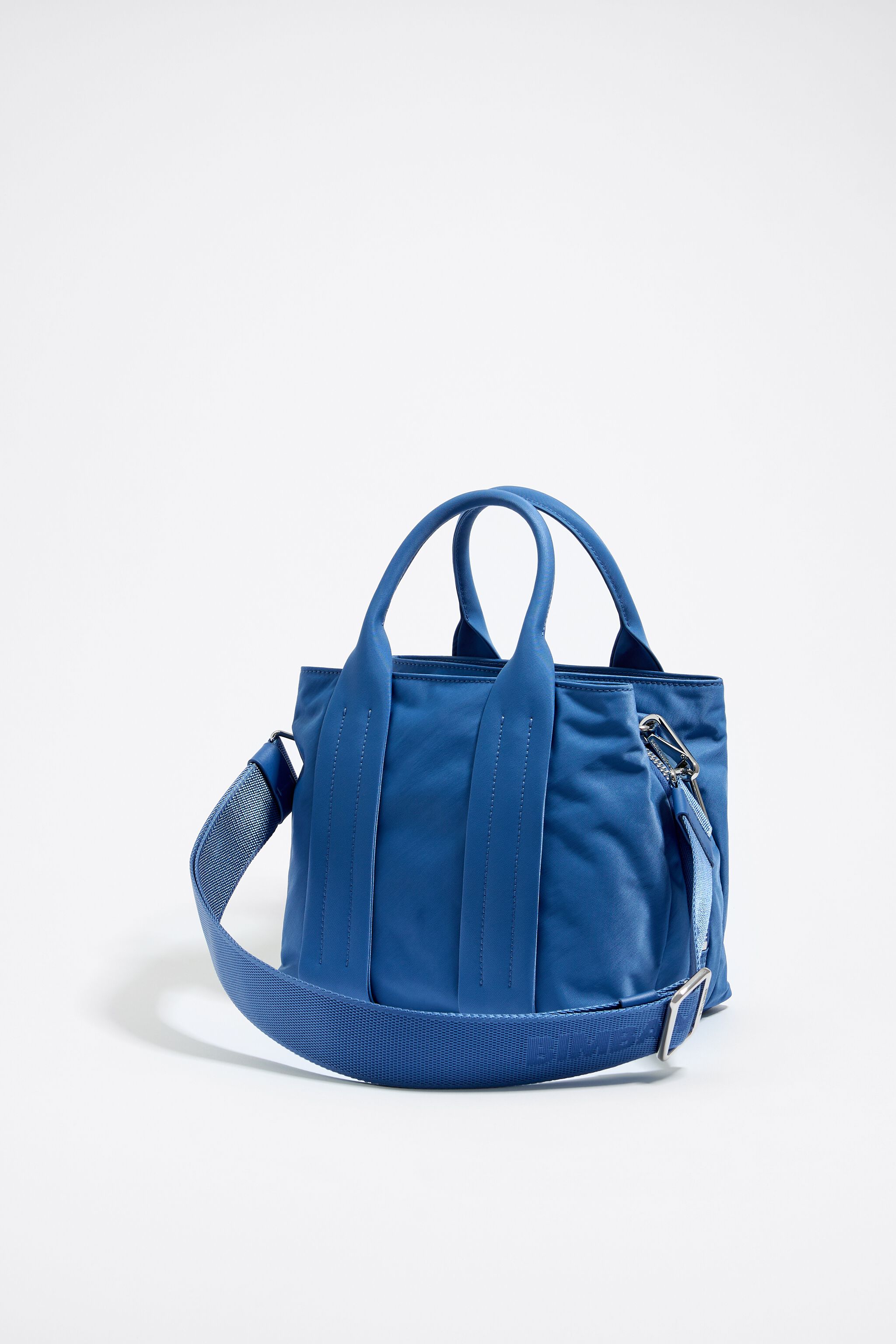 S blue tote bag