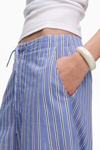 Pantalon jogger algod&oacute;n rayas azules