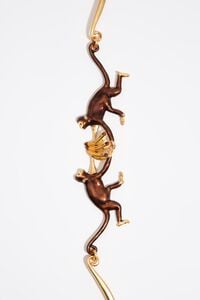 Collar monos y pl&aacute;tanos dorado