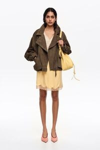 Yellow lace mini skirt