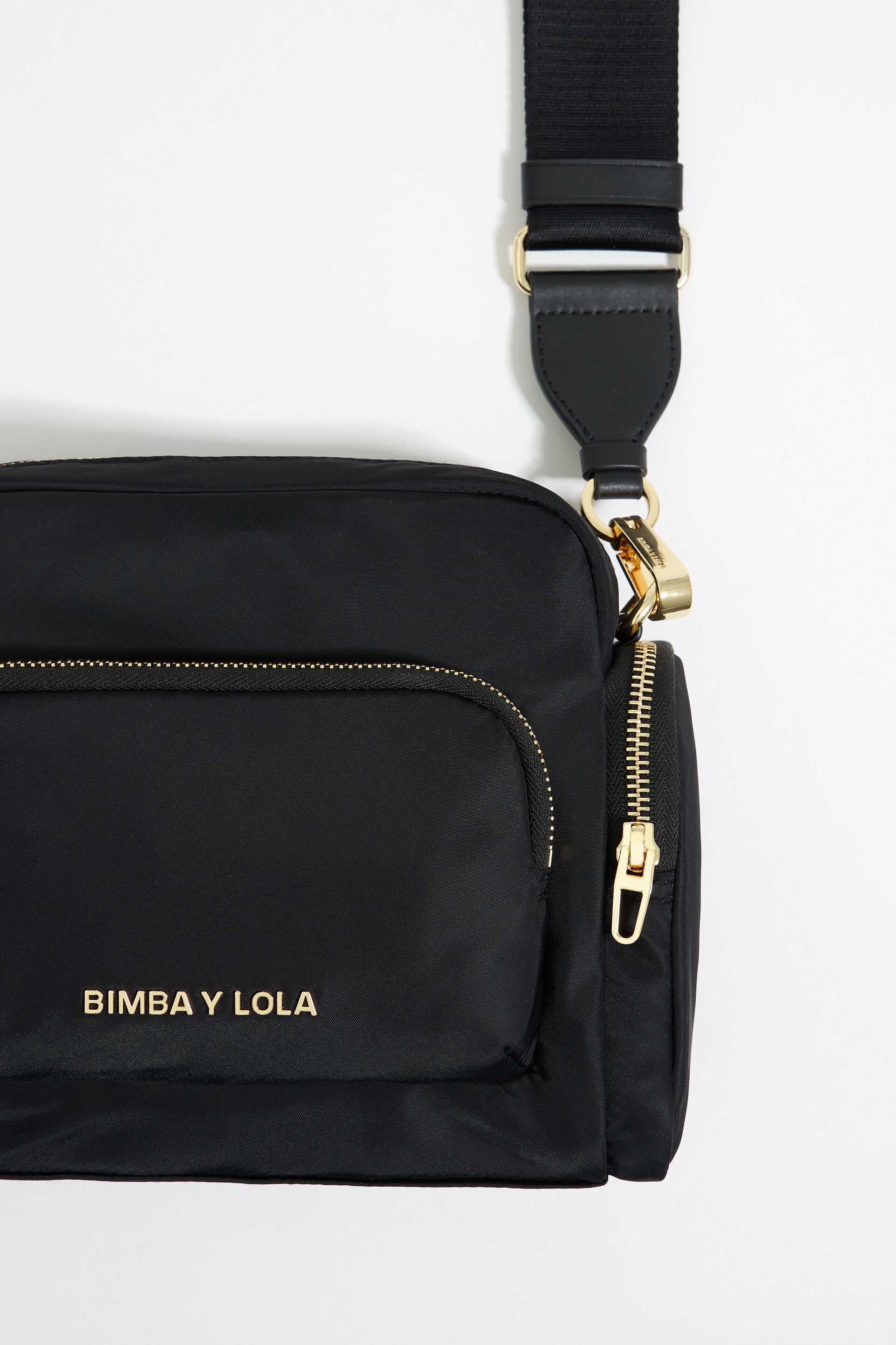 Medium black multi-pocket crossbody bag