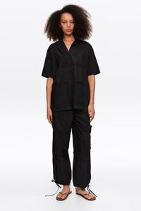 Pantal&oacute;n patchwork de pa&ntilde;uelos bordados negro