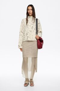 Suéter boxy cuello alto Lynx marfil