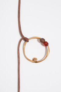 Collar aro irregular y piedras dorado mate