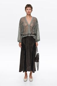 Faded black fluid skirt with lace ruffles