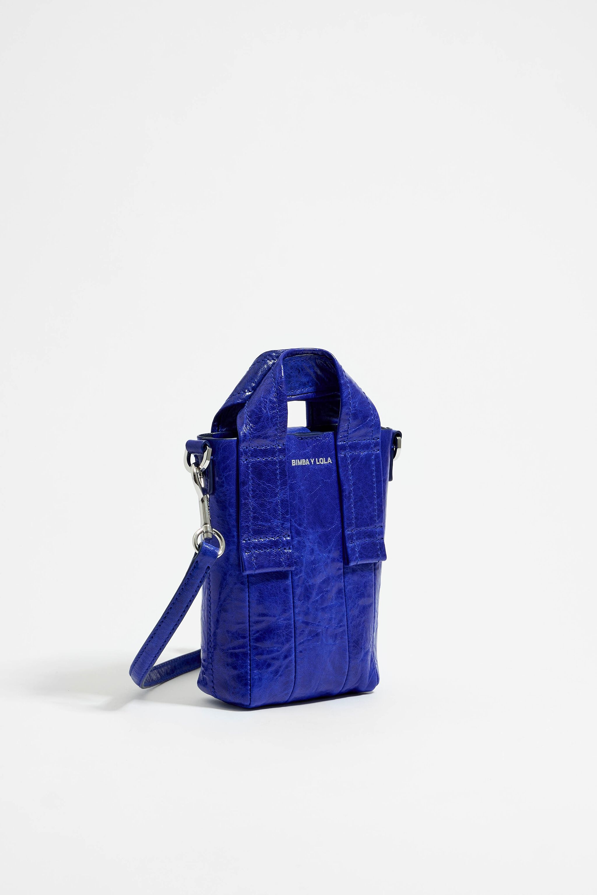 Electric blue crossbody hotsell bag