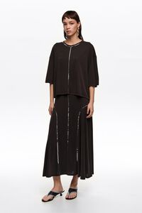 Falda fluida lentejuelas negro lavado