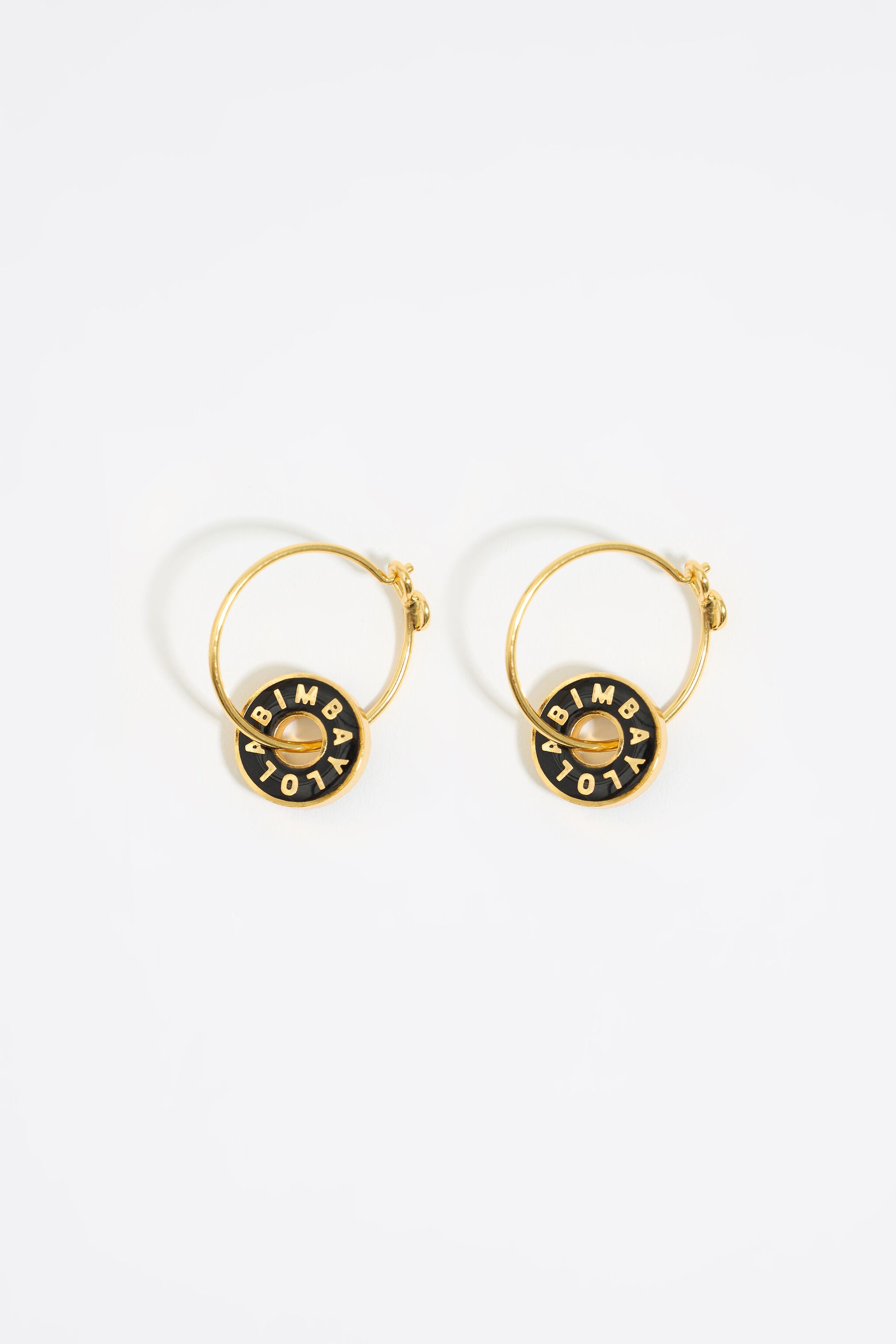 【BIMBA Y LOLA】ロゴ入りボタンピアス BIMBA Y LOLA logo stud earrings in gold and ivory | ASOS