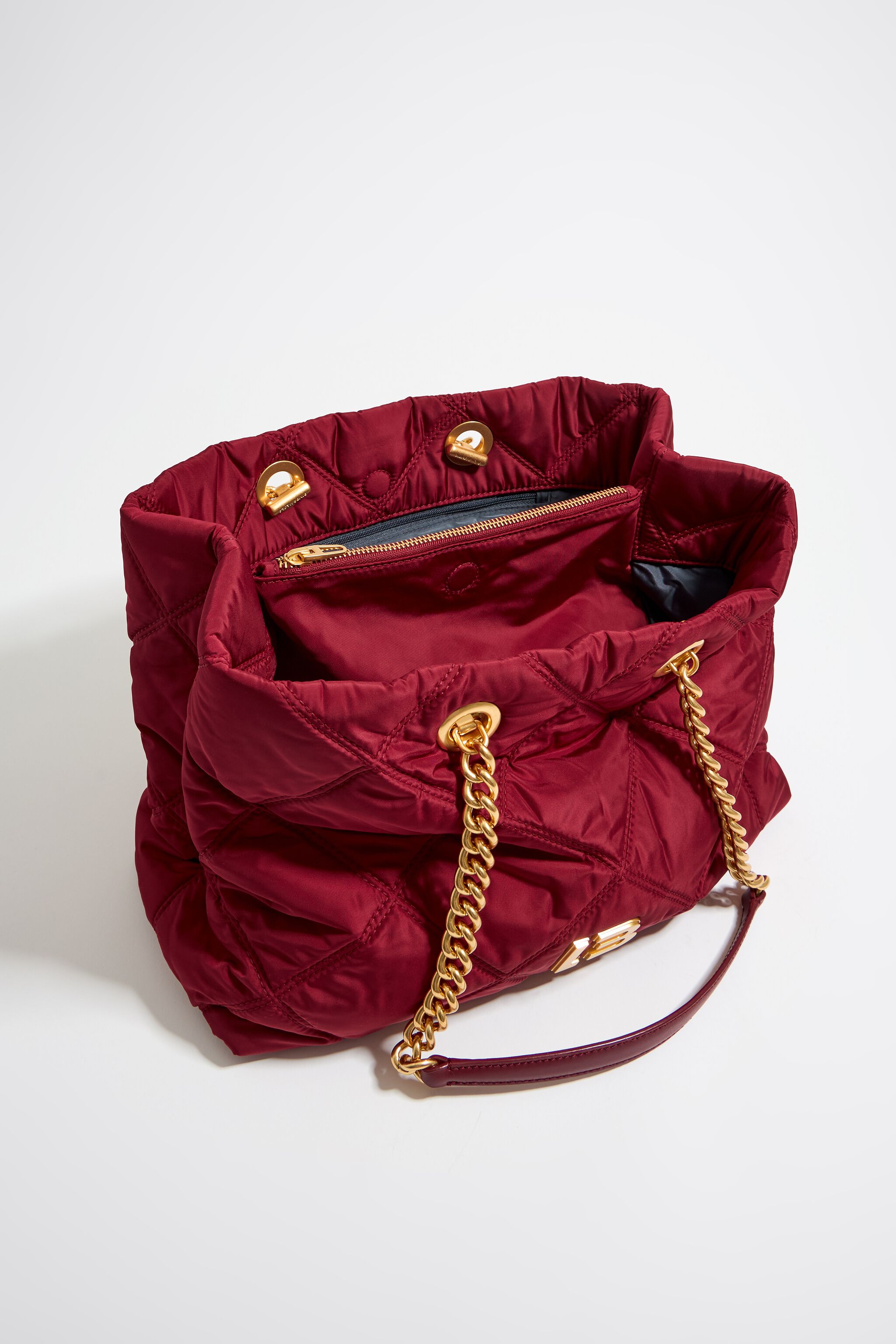 Large dark red padded shopper bag