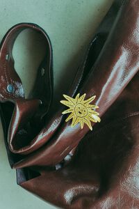 Sun bracelet with brushed gold texture